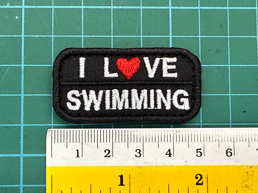 I LOVE SWIMMING VELCRO PATCH - 5 CM X 2.5 CM (BLACK)