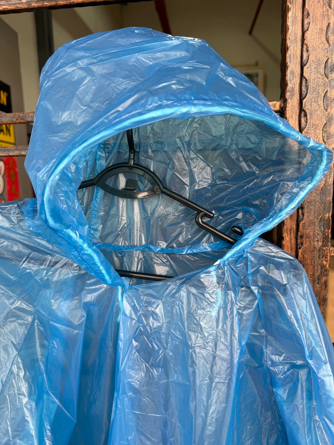 DISPOSABLE PONCHO WITH SLEEVES & DRAWSTRING HOOD