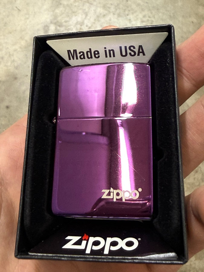 ZIPPO HIGH POLISHED ABYSS (OLD STOCK, SURFACE STAINED WITH A HAIRLINE SCRATCH)