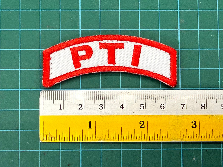 SPF PTI Velcro Tab - 6.5 cm (White Cloth with Red Wording)