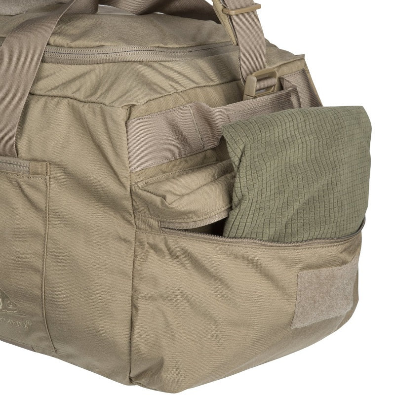 Helikon-Tex 70L bag showing side zippered pockets