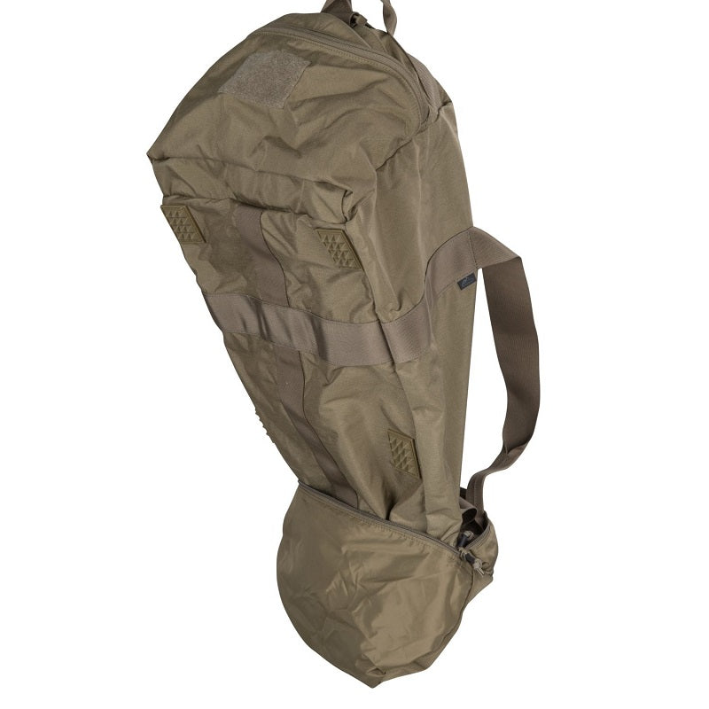 Helikon-Tex 70L bag folded into its side pocket for compact storage